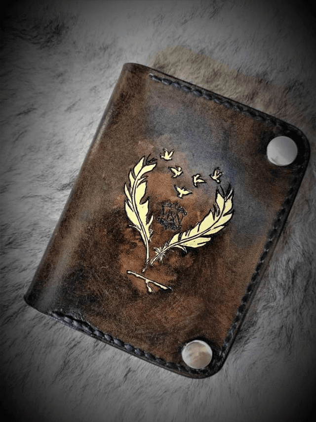 Portefeuille coeur de plumes